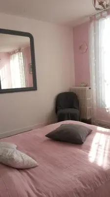 Un ou plusieurs lits dans un hébergement de l'établissement Chambres de Charme a la Ferme