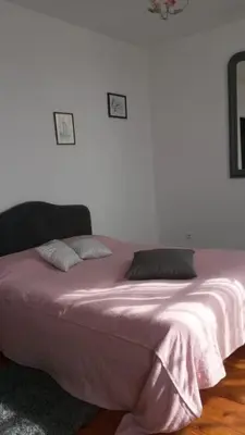 Un ou plusieurs lits dans un hébergement de l'établissement Chambres de Charme a la Ferme