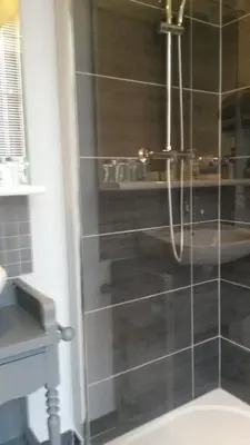 Salle de bains dans l'établissement Chambres de Charme a la Ferme