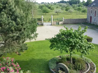 Jardin de l'établissement Chambres de Charme a la Ferme