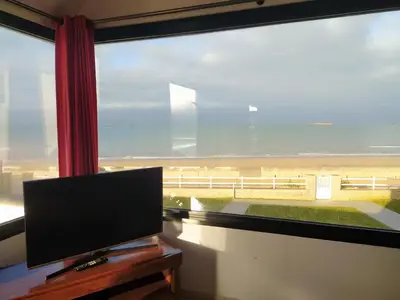 Télévision ou salle de divertissement dans l'établissement Gites 