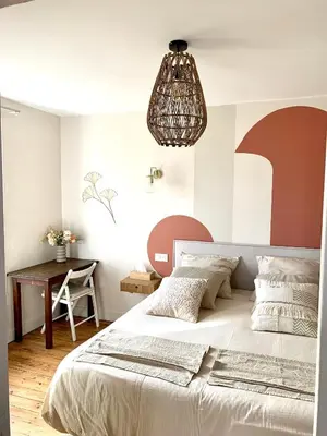 Un ou plusieurs lits dans un hébergement de l'établissement Charmante maison Cabourg