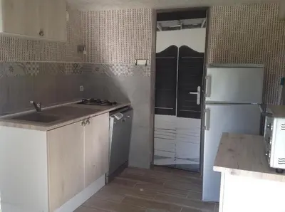 Cuisine ou kitchenette dans l'établissement L'Ancien Pressoir