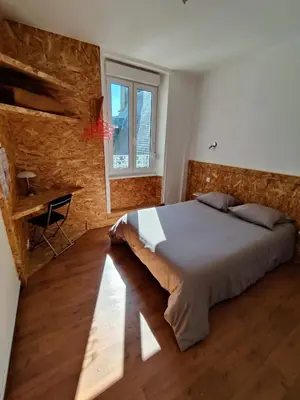 Un ou plusieurs lits dans un hébergement de l'établissement Hôtel Saint - Pierre
