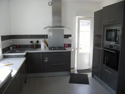 Cuisine ou kitchenette dans l'établissement Les Sables d'or