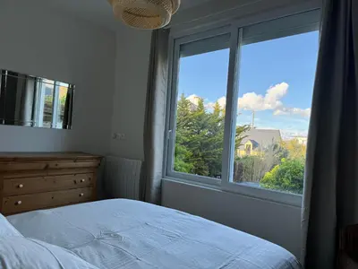 Un ou plusieurs lits dans un hébergement de l'établissement Villa Denise Grand Gîte