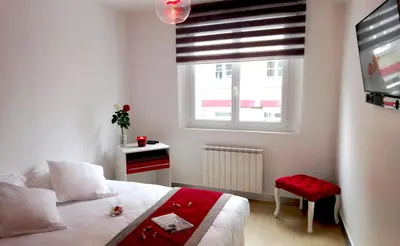 Un ou plusieurs lits dans un hébergement de l'établissement APPART'HOTEL61 Comme à la maison au Cœur de la Normandie