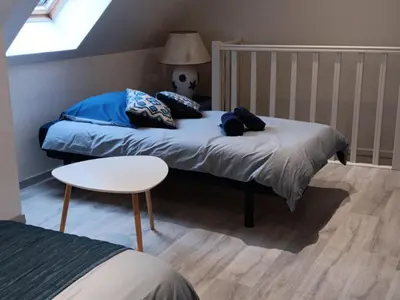 Un ou plusieurs lits dans un hébergement de l'établissement Maison de vacances à Créances
