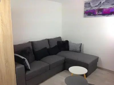 Coin salon dans l'établissement Appartement sur 3 niveaux centre ville CAEN