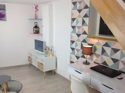 Télévision ou salle de divertissement dans l'établissement Appartement sur 3 niveaux centre ville CAEN