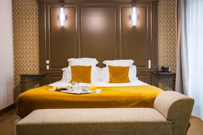 Un ou plusieurs lits dans un hébergement de l'établissement Grand Hôtel du Luxembourg & Spa