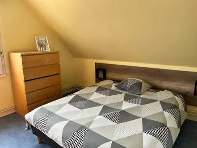 Un ou plusieurs lits dans un hébergement de l'établissement Camping De Collignon