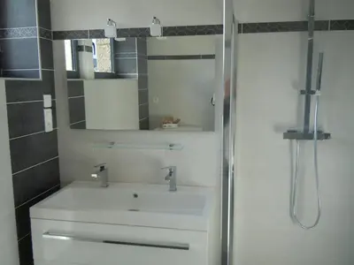 Salle de bains dans l'établissement La Greve Saint Michel