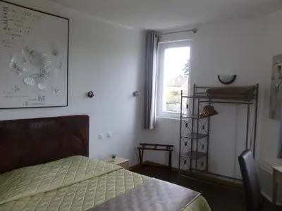 Un ou plusieurs lits dans un hébergement de l'établissement Hotel Jersey