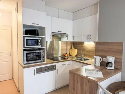 Cuisine ou kitchenette dans l'établissement Apartment Le Vieux Port by Interhome