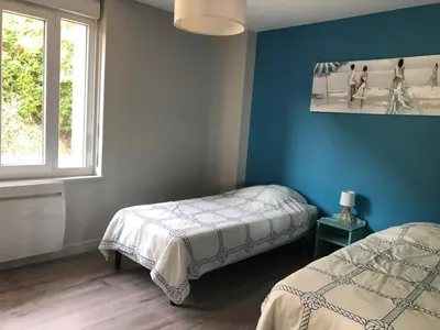Un ou plusieurs lits dans un hébergement de l'établissement La Plage d'Or