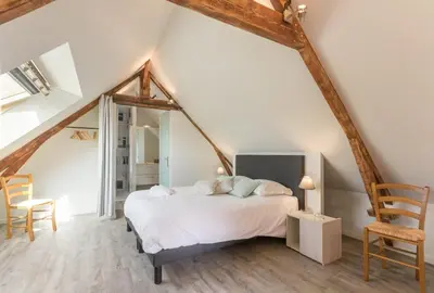 Un ou plusieurs lits dans un hébergement de l'établissement Le Relais des Flâneurs