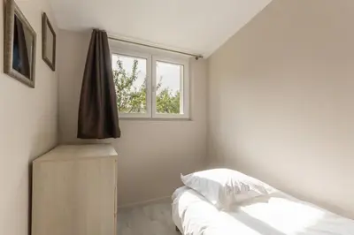 Un ou plusieurs lits dans un hébergement de l'établissement Le Relais des Flâneurs