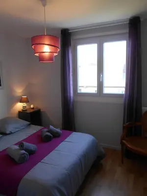 Un ou plusieurs lits dans un hébergement de l'établissement Gîte de Eric et Rose