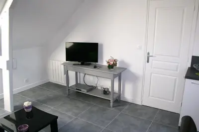 Télévision ou salle de divertissement dans l'établissement La Cattevillaise