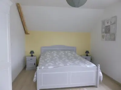 Un ou plusieurs lits dans un hébergement de l'établissement Les Hirondelles de la Baie