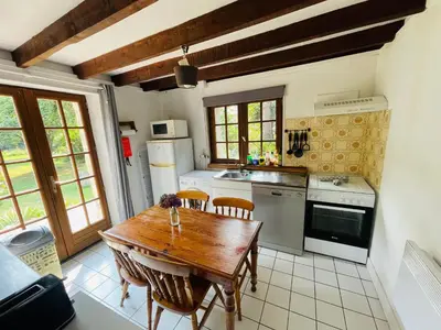 Cuisine ou kitchenette dans l'établissement Le Moulin L'Eveque