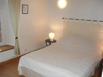 Un ou plusieurs lits dans un hébergement de l'établissement Chambres d'hôtes Au Hameau