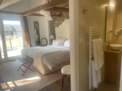 Un ou plusieurs lits dans un hébergement de l'établissement Hôtel Victor Hugo