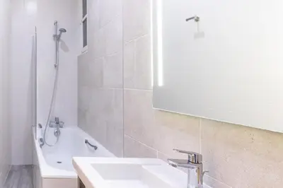 Salle de bains dans l'établissement La Confiance