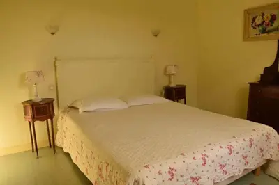 Un ou plusieurs lits dans un hébergement de l'établissement Maison de charme avec jardin à Courtils, proche du Mont Saint-Michel