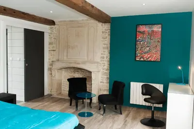 Coin salon dans l'établissement Maison Bayeux 4 chambres