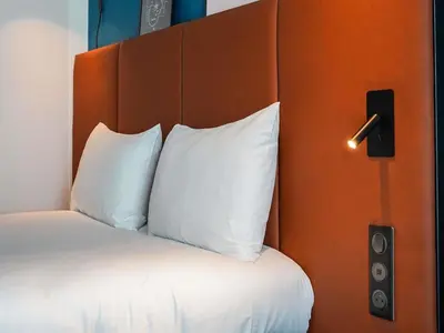 Un ou plusieurs lits dans un hébergement de l'établissement ibis Bayeux Port En Bessin