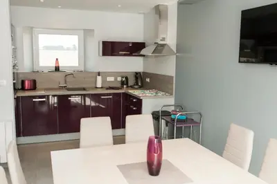 Cuisine ou kitchenette dans l'établissement bayeux maison pierre 3 chambres