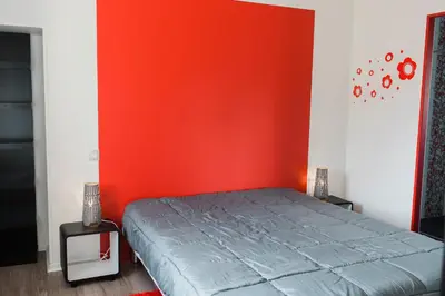 Un ou plusieurs lits dans un hébergement de l'établissement bayeux maison pierre 3 chambres
