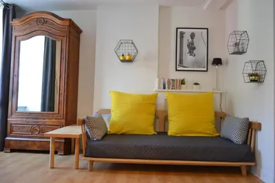 Coin salon dans l'établissement La Maison Des Buis