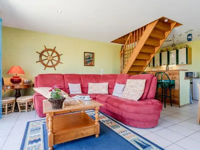 Coin salon dans l'établissement Holiday Home Chez Lilo by Interhome