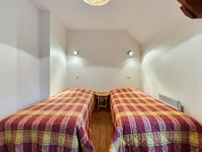 Un ou plusieurs lits dans un hébergement de l'établissement Holiday Home La Voisinière no-1 by Interhome