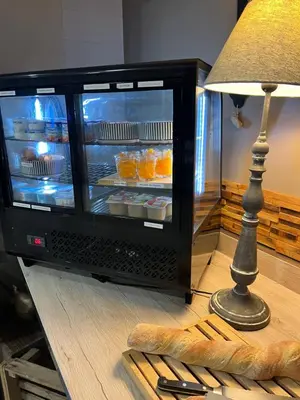 Télévision ou salle de divertissement dans l'établissement Hotel Best Western La Mare Ô Poissons