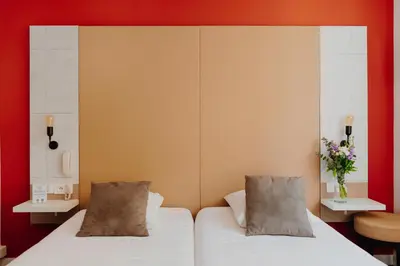 Un ou plusieurs lits dans un hébergement de l'établissement L'Hôtel Bristol