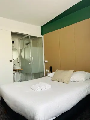 Un ou plusieurs lits dans un hébergement de l'établissement L'Hôtel Bristol