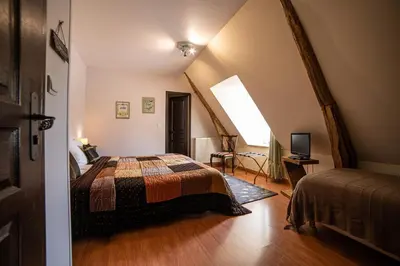 Un ou plusieurs lits dans un hébergement de l'établissement Domaine De La Tour