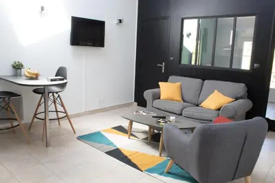 Télévision ou salle de divertissement dans l'établissement Le loft du Clos d'Esquay