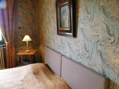 Un ou plusieurs lits dans un hébergement de l'établissement Chambre d'hotes La Jaunais