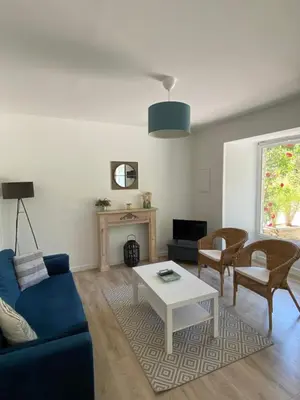 Coin salon dans l'établissement Ferme de Riou