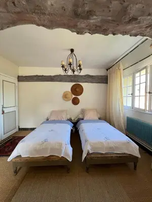 Un ou plusieurs lits dans un hébergement de l'établissement Chambres d'Hôtes Manoir Du Chêne