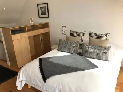 Un ou plusieurs lits dans un hébergement de l'établissement Aux 13 Arches-Logis Hôtel Restaurant