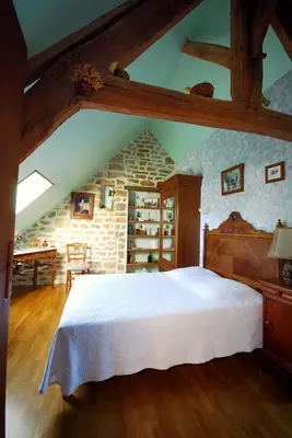 Un ou plusieurs lits dans un hébergement de l'établissement Gîte/Guest House close to the Mont Saint Michel