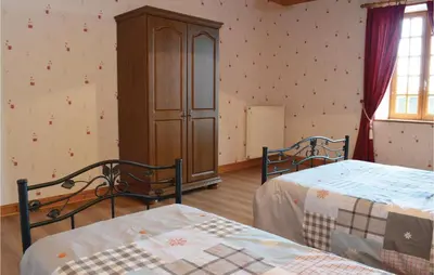 Un ou plusieurs lits dans un hébergement de l'établissement Nice Home In Canchy With Kitchen
