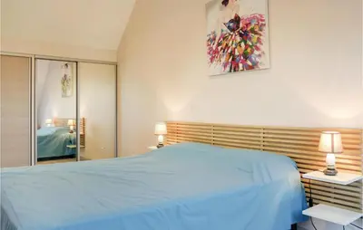 Un ou plusieurs lits dans un hébergement de l'établissement Nice Home In Saint Germain Sur Ay