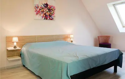 Un ou plusieurs lits dans un hébergement de l'établissement Nice Home In Saint Germain Sur Ay